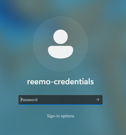 Windows lock screen with the reemo-credentials account selected, showing Sign-in options